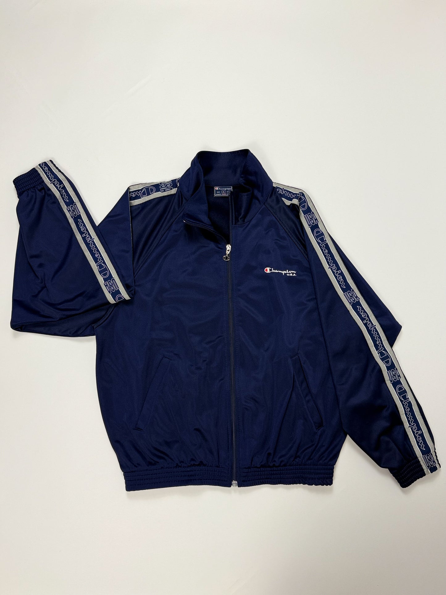 GIACCA TUTA CHAMPION IN ACETATO