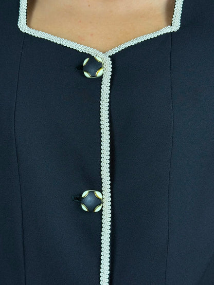 Giacca vintage sartoriale nera con bordi bianchi e spalline imbottite – anni ’80
