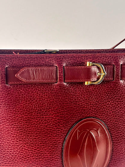 Borsa Must de Cartier Paris vintage in pelle martellata bordeaux – anni ’80