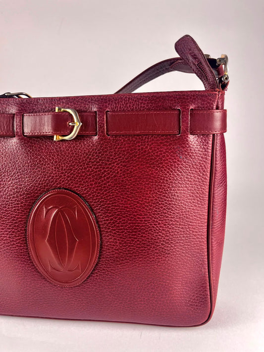 Borsa Must de Cartier Paris vintage in pelle martellata bordeaux – anni ’80